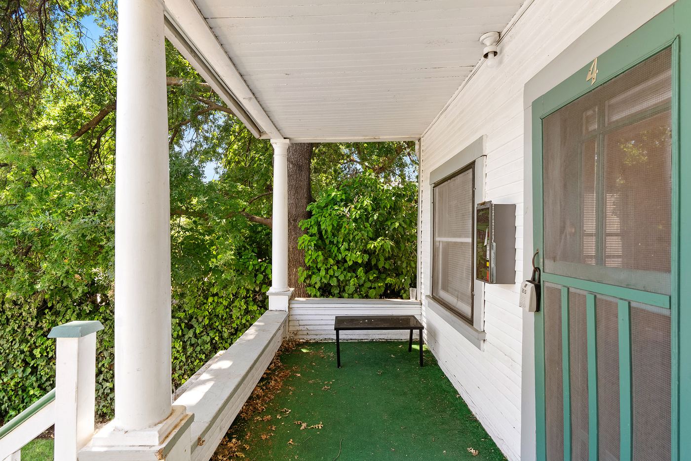 Covered front porch with bench